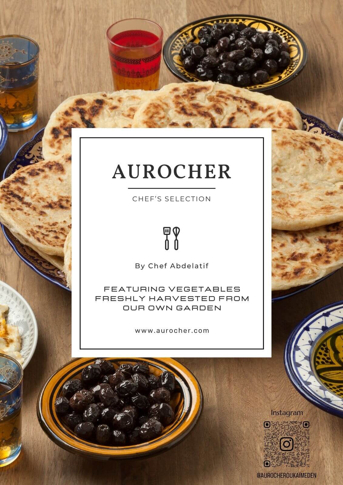 Traditional Moroccan breakfast with flatbread, olives, and mint tea at Aurocher eco-lodge in the High Atlas Mountains.